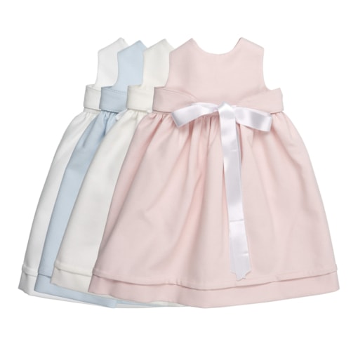 Três cueiros de bebé em tecido piquet de cor branca, azul e rosa.