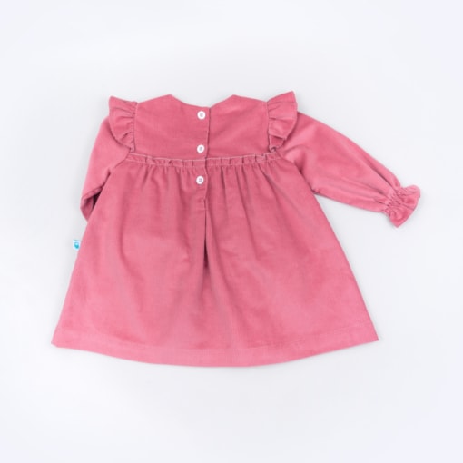 Vista de trás vestido de bebé em bombazine cor de rosa.