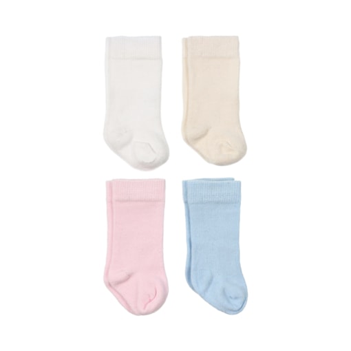 Conjunto de quatro meias para bebé lisas pelo joelho, uma de cor branca, outra pérola, outra rosa e uma azul clara.