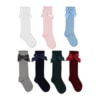Conjunto de sete meias de bebé com laço em diferentes cores.