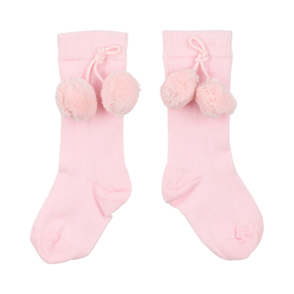 Meias de bebé pelo joelho rosa claro, canelas e com pompons.