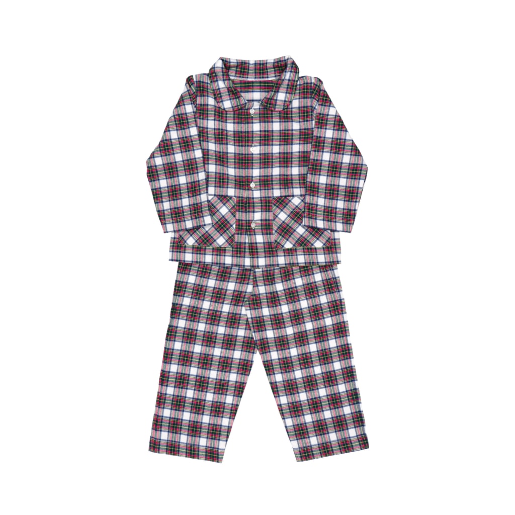 Pijama para bebé de duas peças, camisa e calças, feito em tecido de flanela. A camisa tem gola redonda, dois bolsos e aperta na frente com botões até abaixo. As calças têm elástico na cintura.