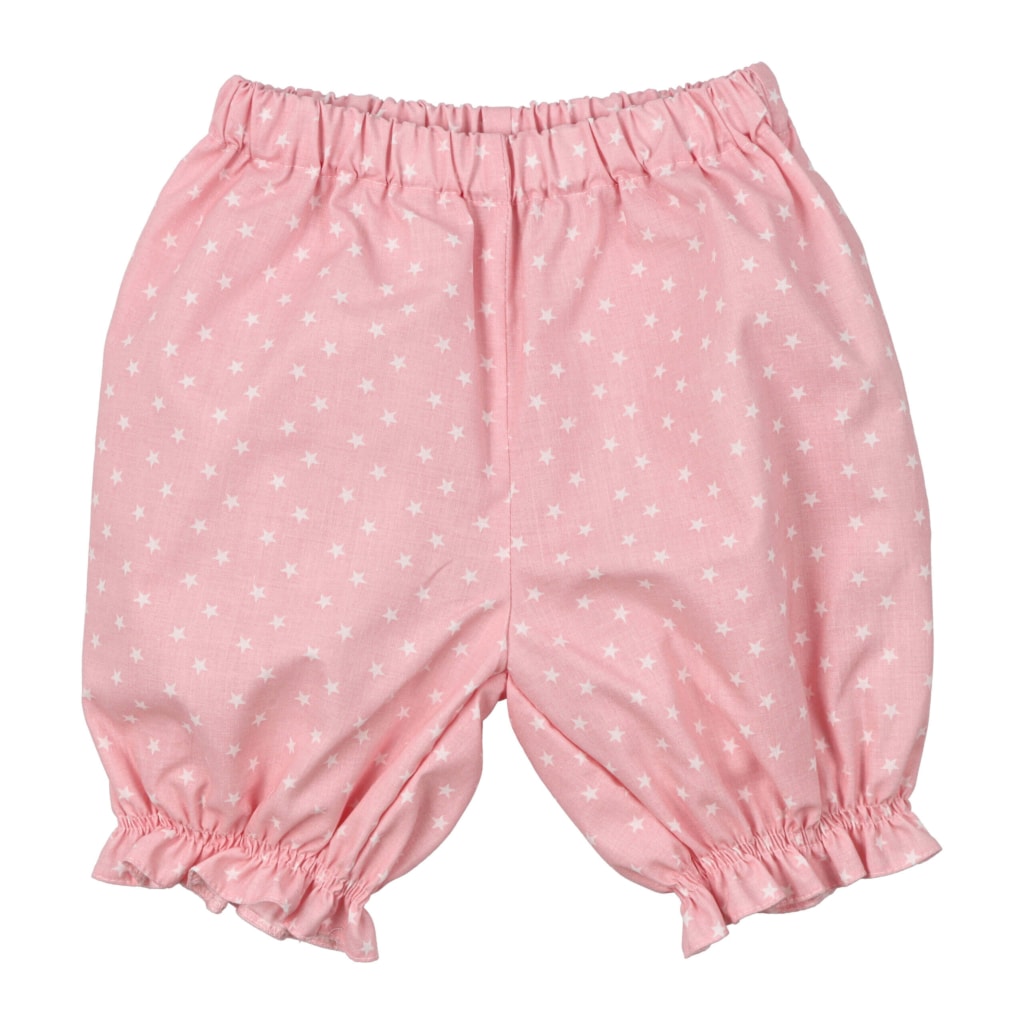 Vista de trás de calções rosa de pijama de verão para criança.