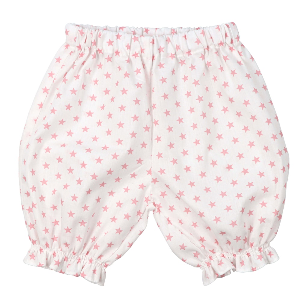 Vista de trás de calções brancos de pijama de verão para criança.