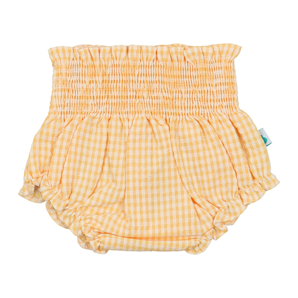 Tapa fraldas de bebé aos quadrados de cor amarelo.