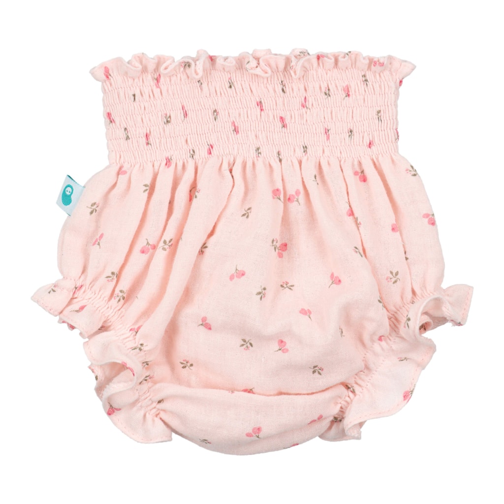 Tapa Fraldas de Bebé rosa com padrão estampado de flores.