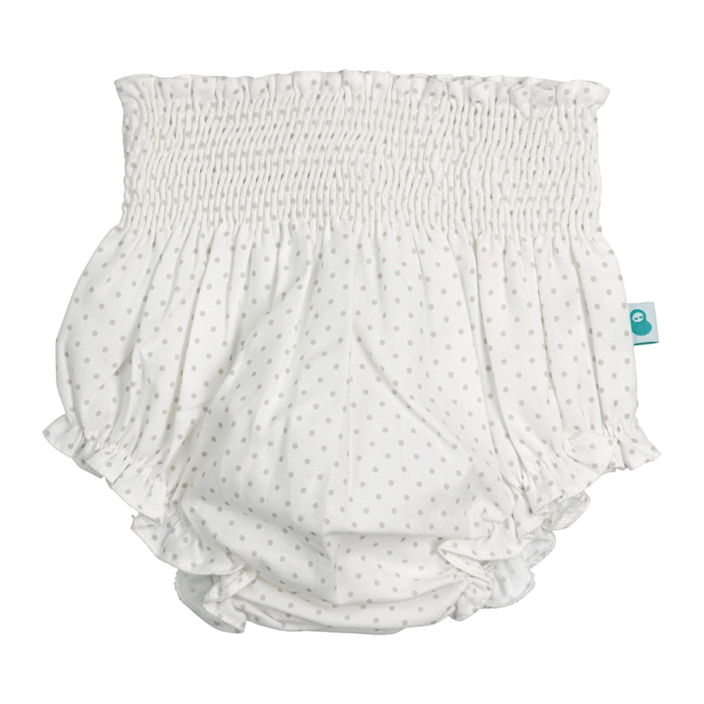 Tapa fraldas de bebé branco com pintas cinzentas. É feito em algodão e tem elástico na cintura e nas pernas.